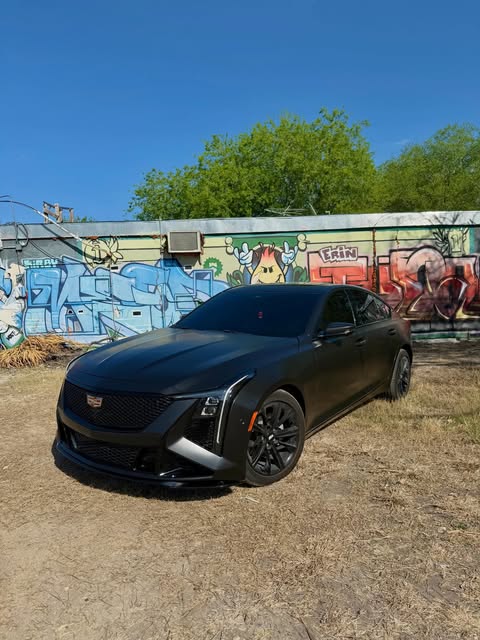 Blacked-out Cadillac with ceramic window tint