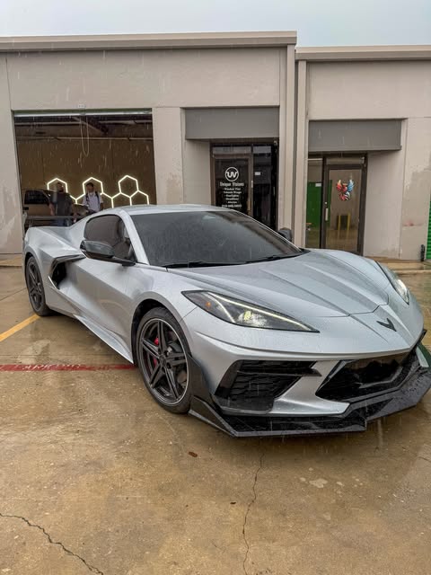 Silver Chevrolet Corvette C8 with tinted glass